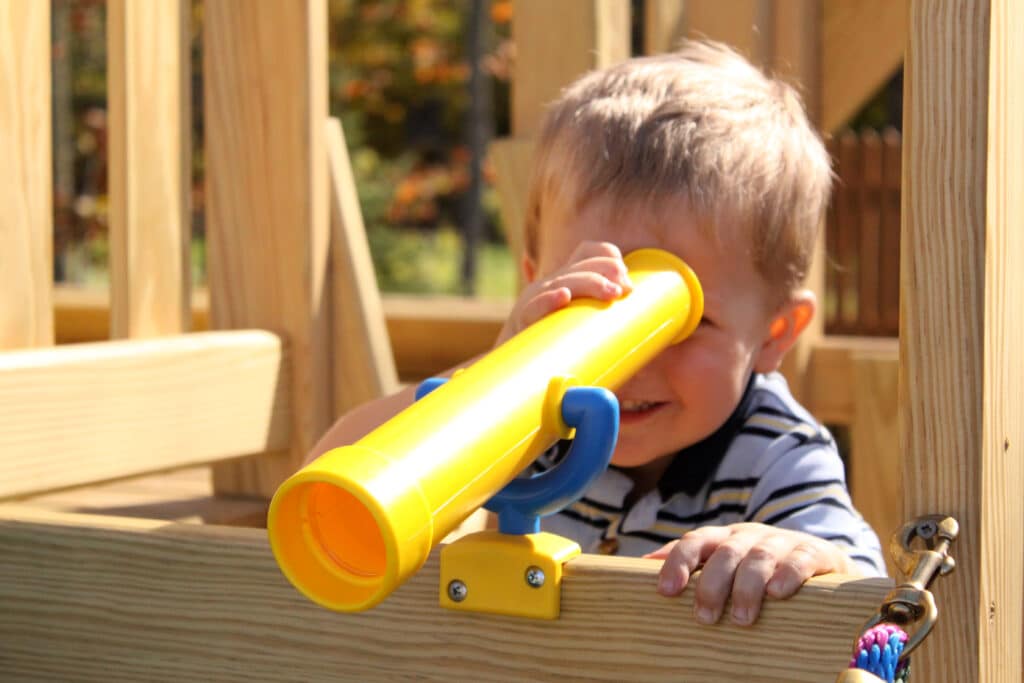 best playsets for children looking through yellow telescope