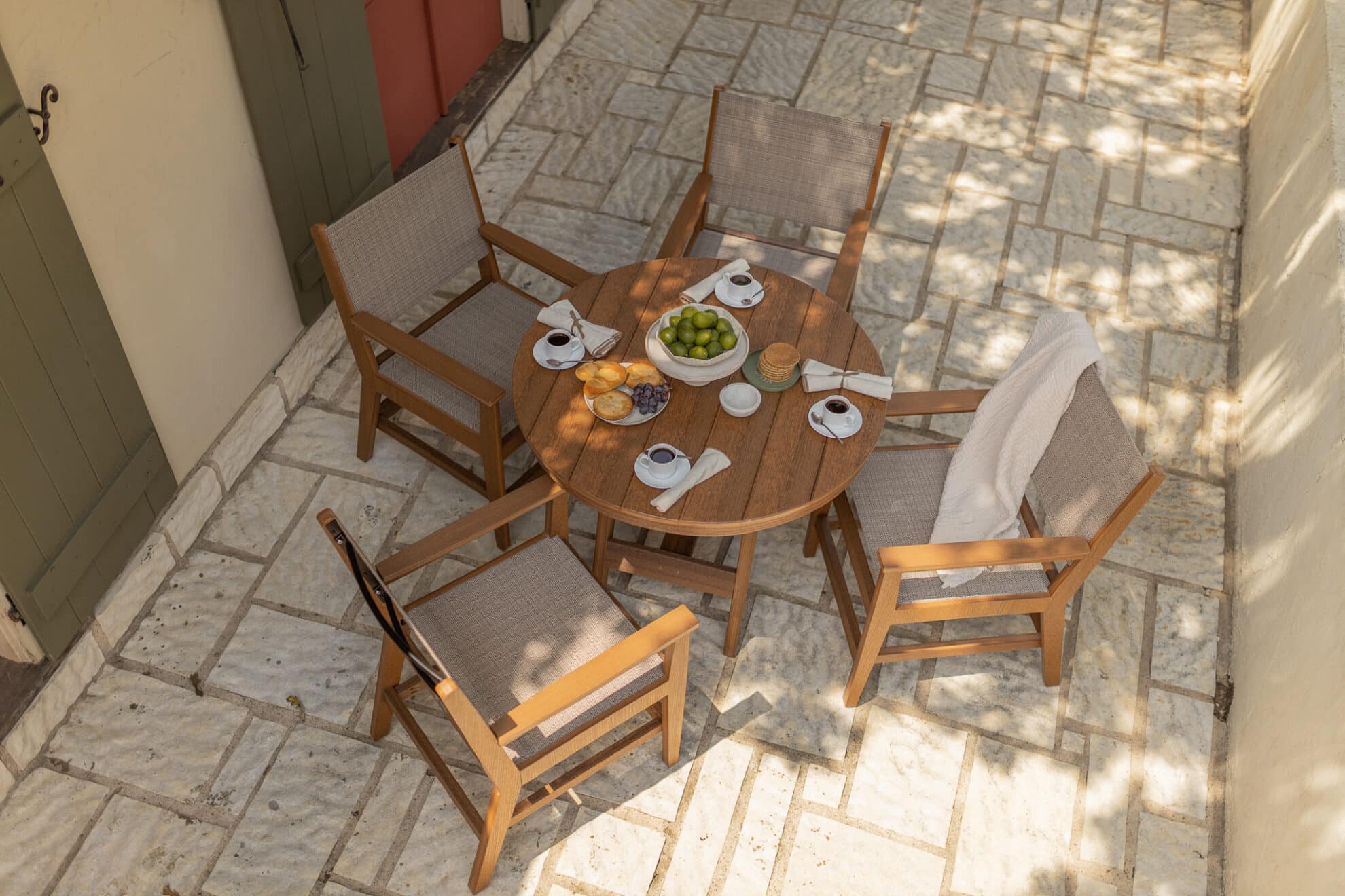 Mayhew sling chair with harbor dining table